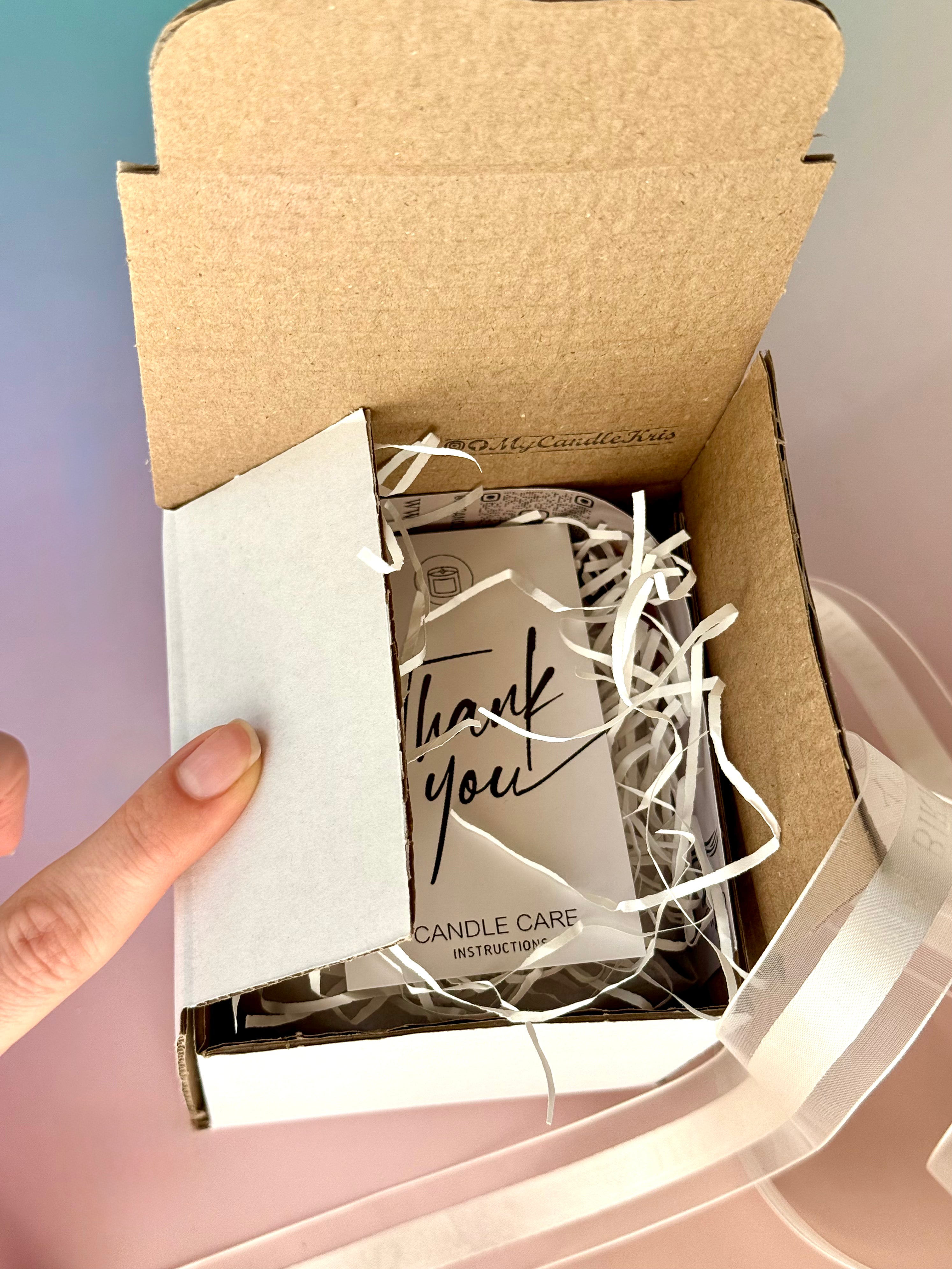 Unboxing experience of a bespoke candle gift set, showing the high-quality presentation for a luxury housewarming gift UK.