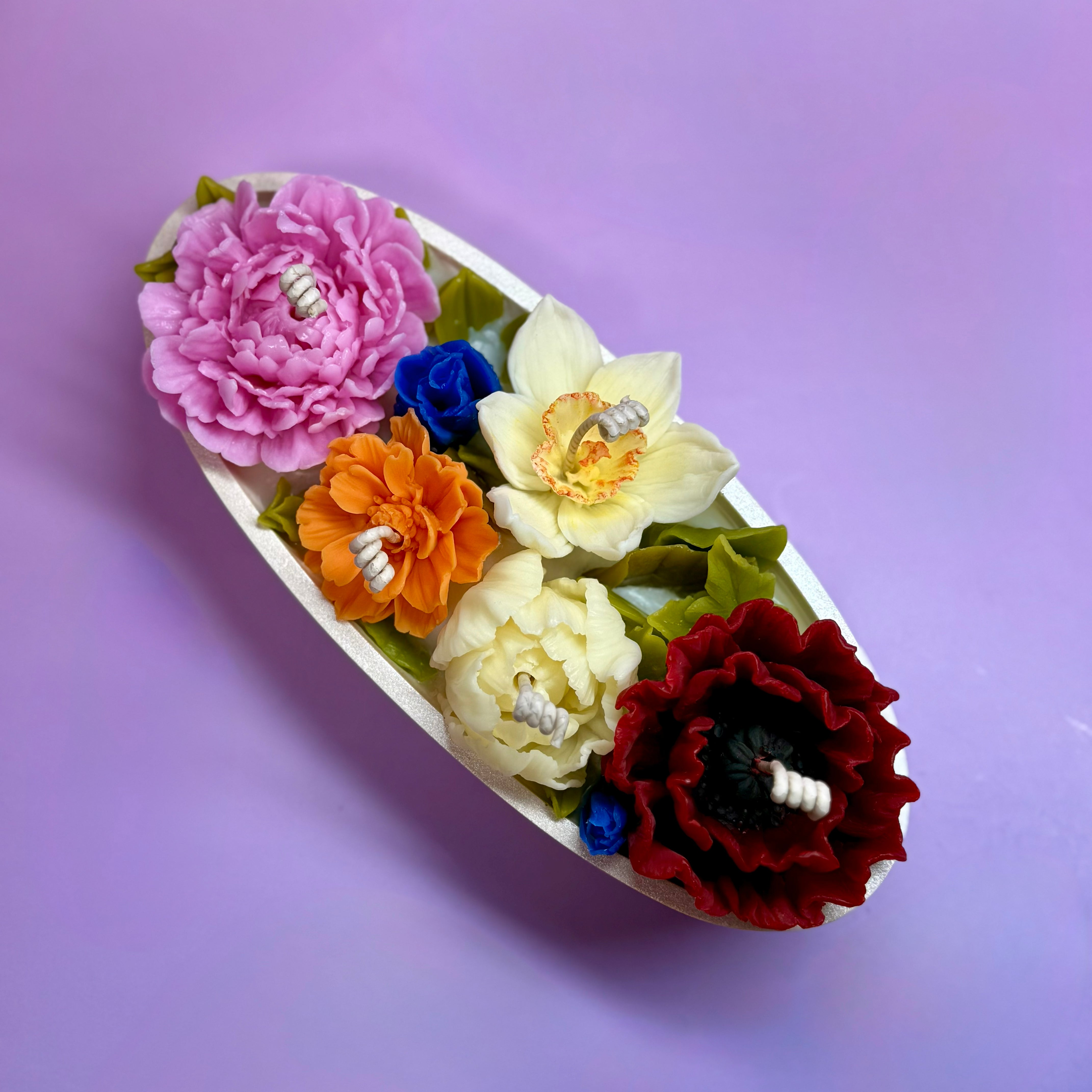 Close-up of floral candles showcasing intricate beeswax petal details, perfect for a high-end flower candle gift.