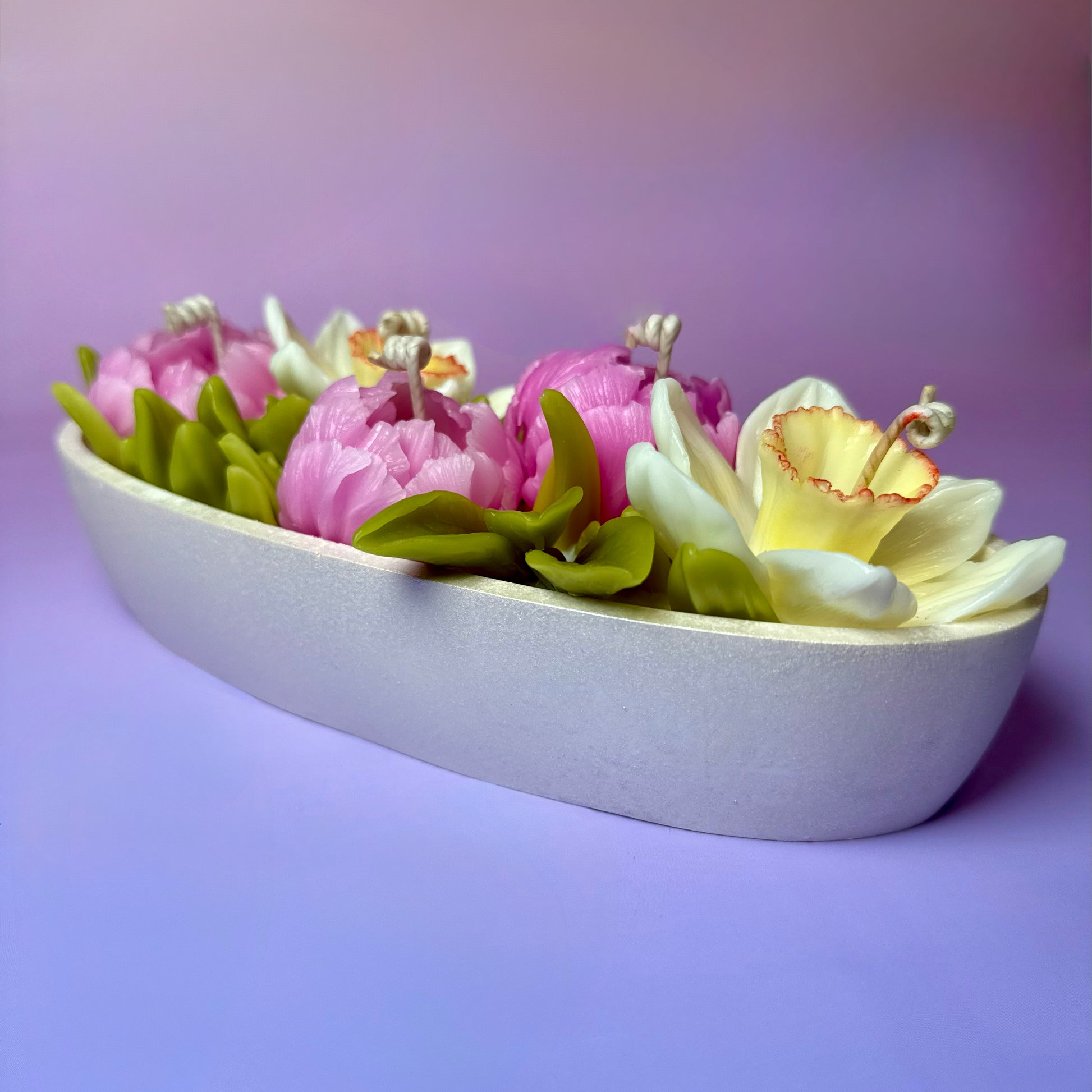 Side profile of a 5-wick artisan floral candle centrepiece with detailed beeswax tulips and narcissus, perfect for wedding table decor or a luxury gift.