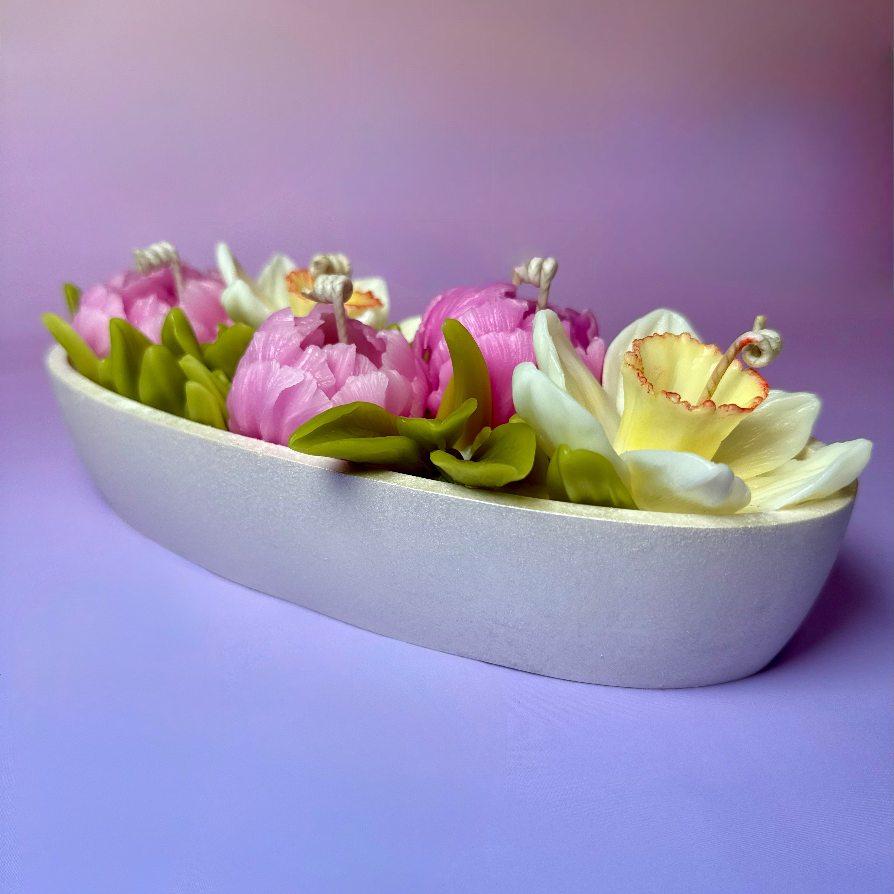 Side profile of a 5-wick artisan floral candle centrepiece with detailed beeswax tulips and narcissus, perfect for wedding table decor or a luxury gift.