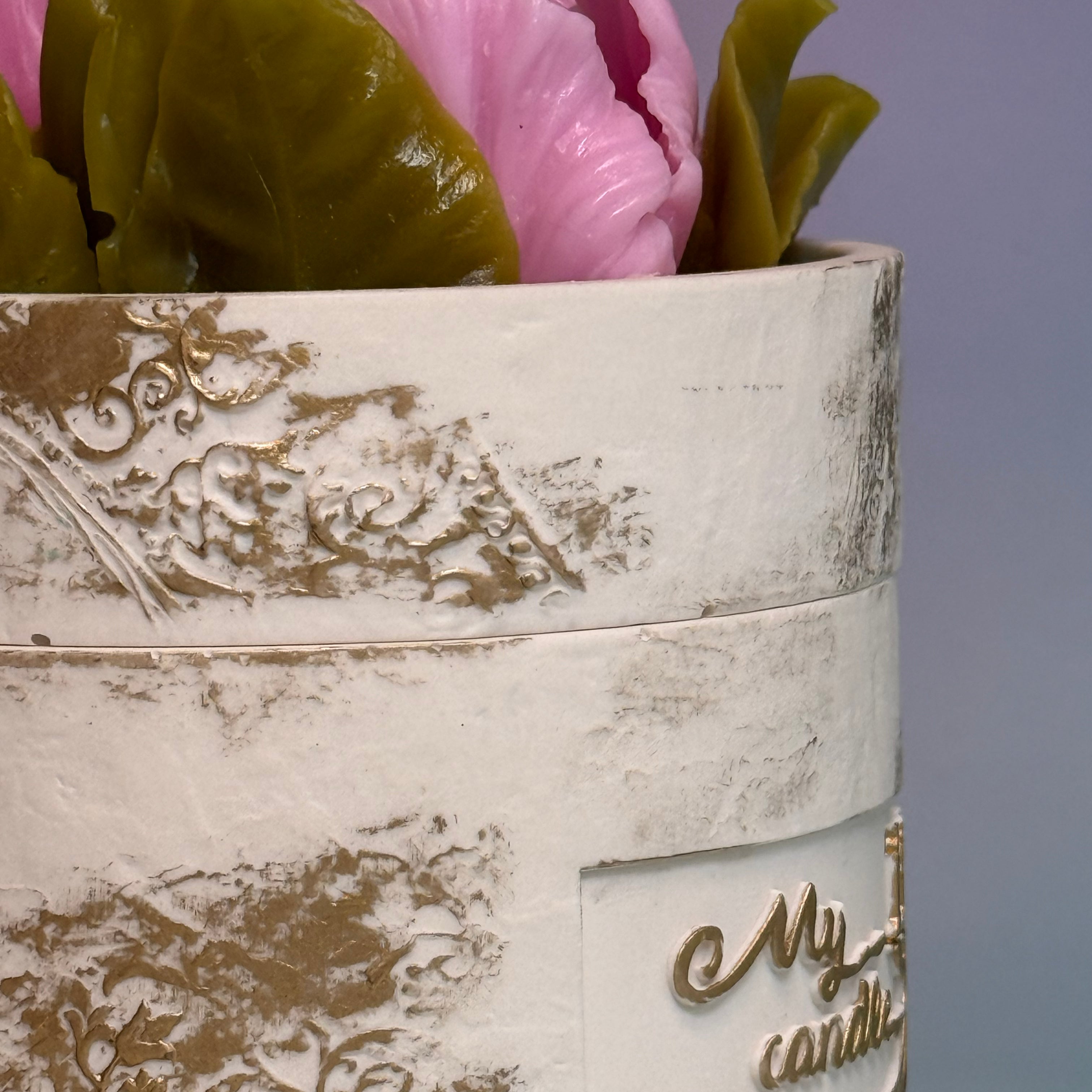 Macro shot of the unique hand-painted texture and 'My Candle' branding on the pot.