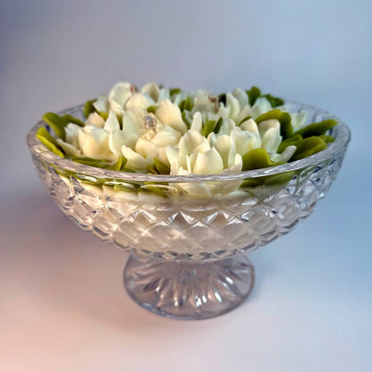 A luxurious soy wax centrepiece candle featuring hand-crafted gardenia beeswax flowers